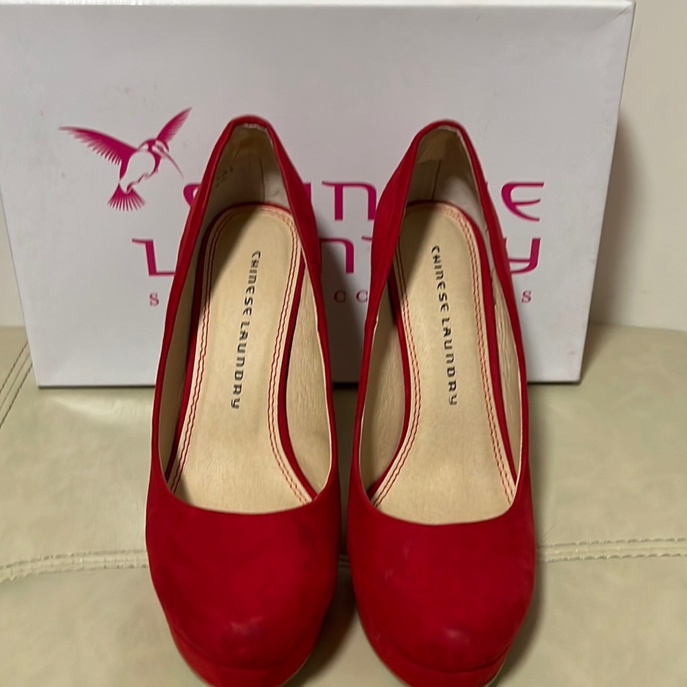 Red microsuede pumps